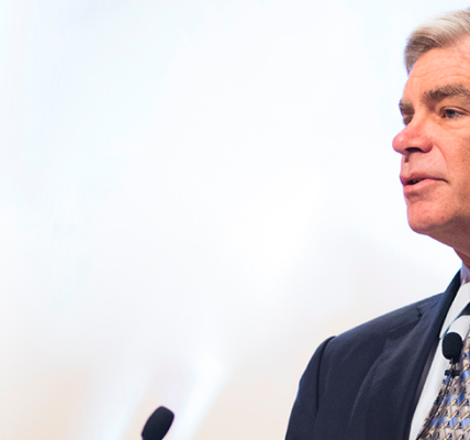 Federal Reserve Bank of Philadelphia President Patrick Harker speaking to an audience