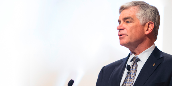 Federal Reserve Bank of Philadelphia President Patrick Harker speaking to an audience