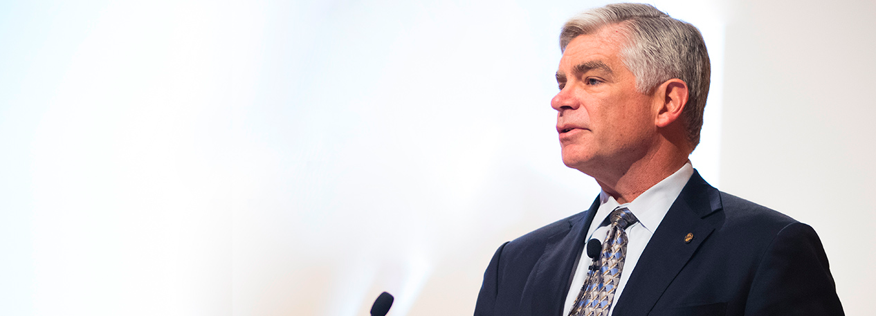 Federal Reserve Bank of Philadelphia President Patrick Harker speaking to an audience